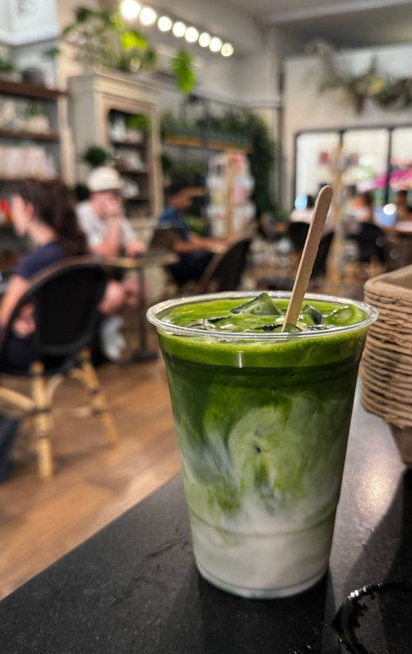 A large cup of iced matcha latte